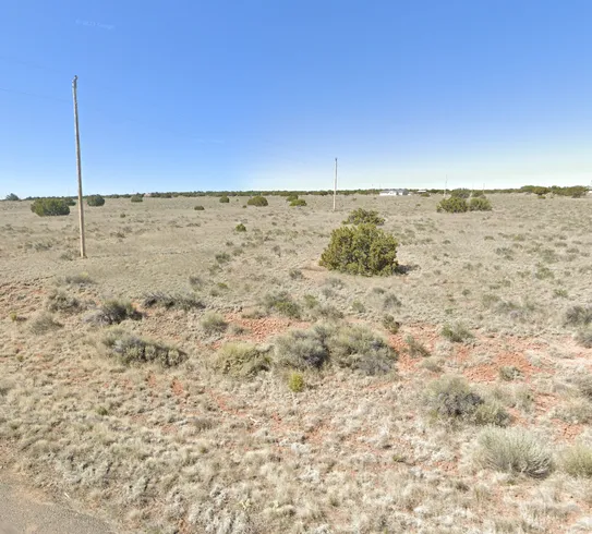 On the parcel — road frontage with power line at the street